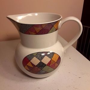 White ceramic pitcher. Studio Nova